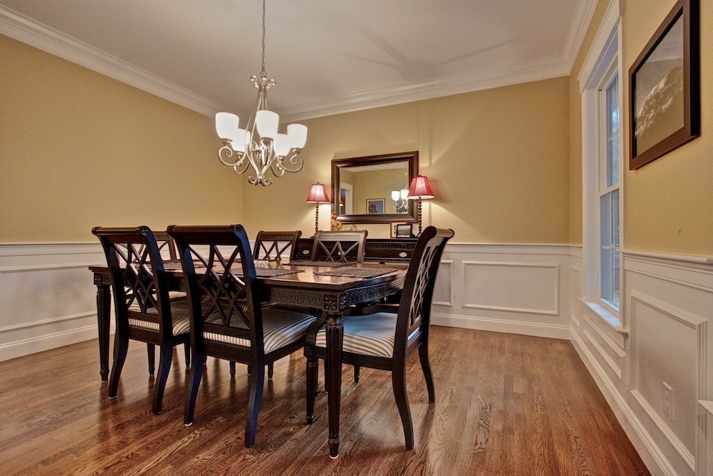 550 Edgell Road Framingham, MA 01701 - Photo 17 of 29 a view of a dining room with furniture and wooden floor