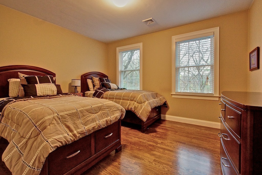 550 Edgell Road Framingham, MA 01701 - Photo 26 of 29 a bedroom with two beds and a window