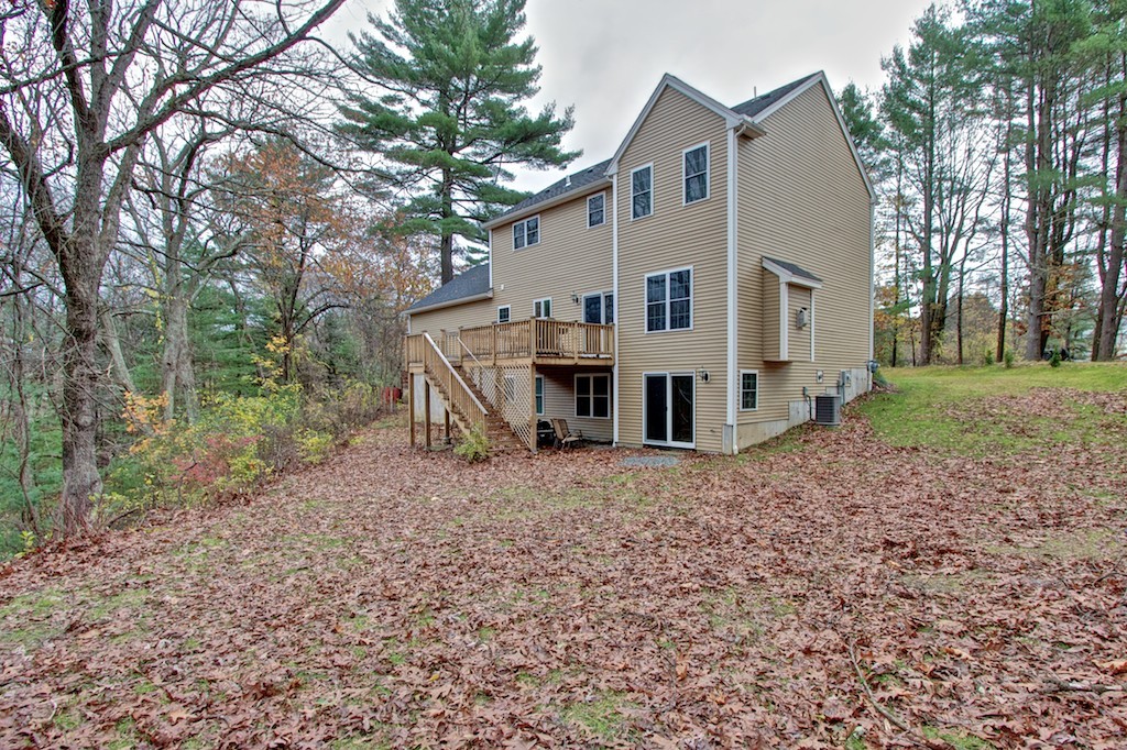 550 Edgell Road Framingham, MA 01701 - Photo 3 of 29 a view of a house with a yard