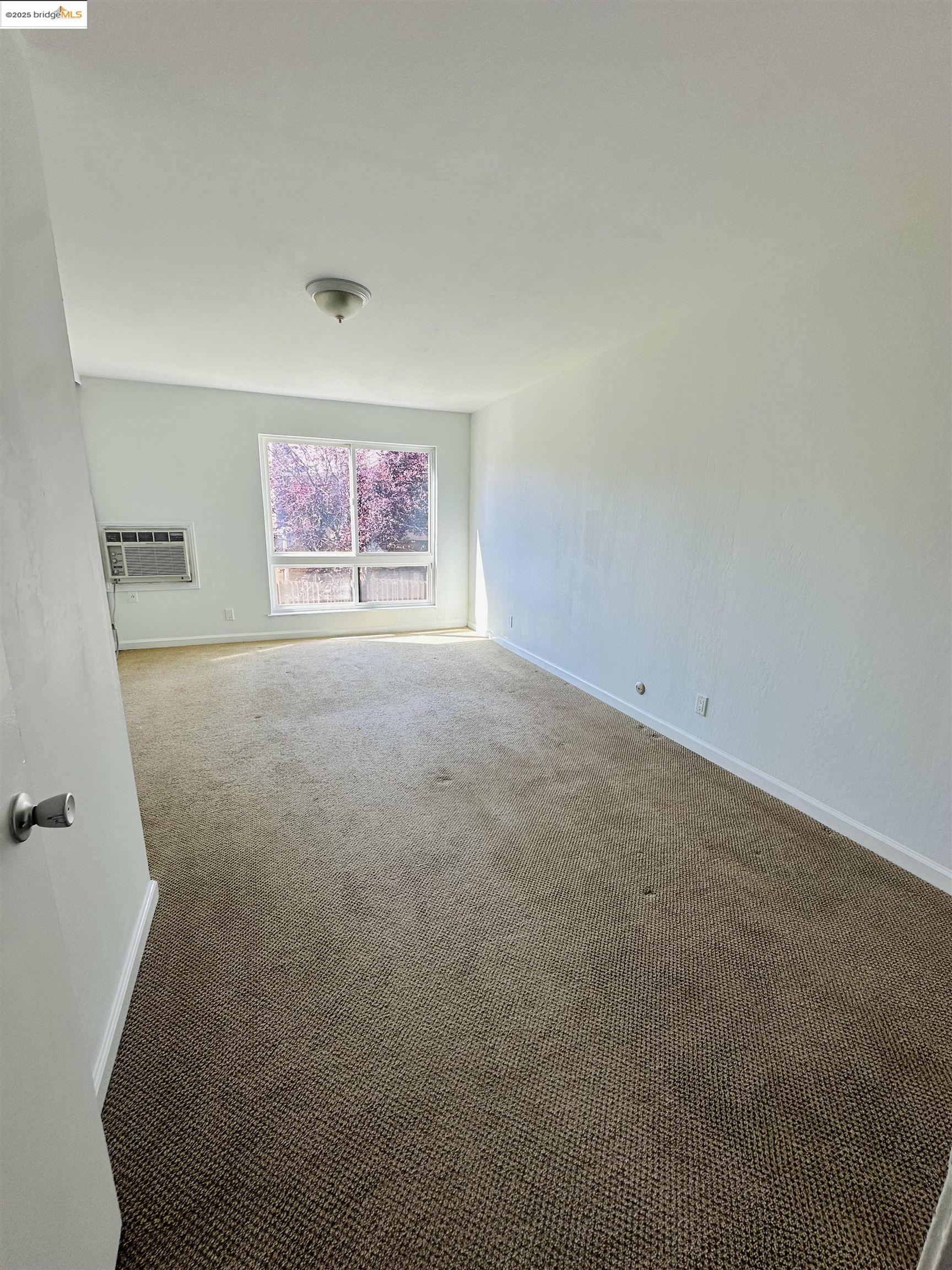 9005 Alcosta Boulevard, Unit 189 San Ramon, CA 94583 - Photo 10 of 20 an empty room with windows