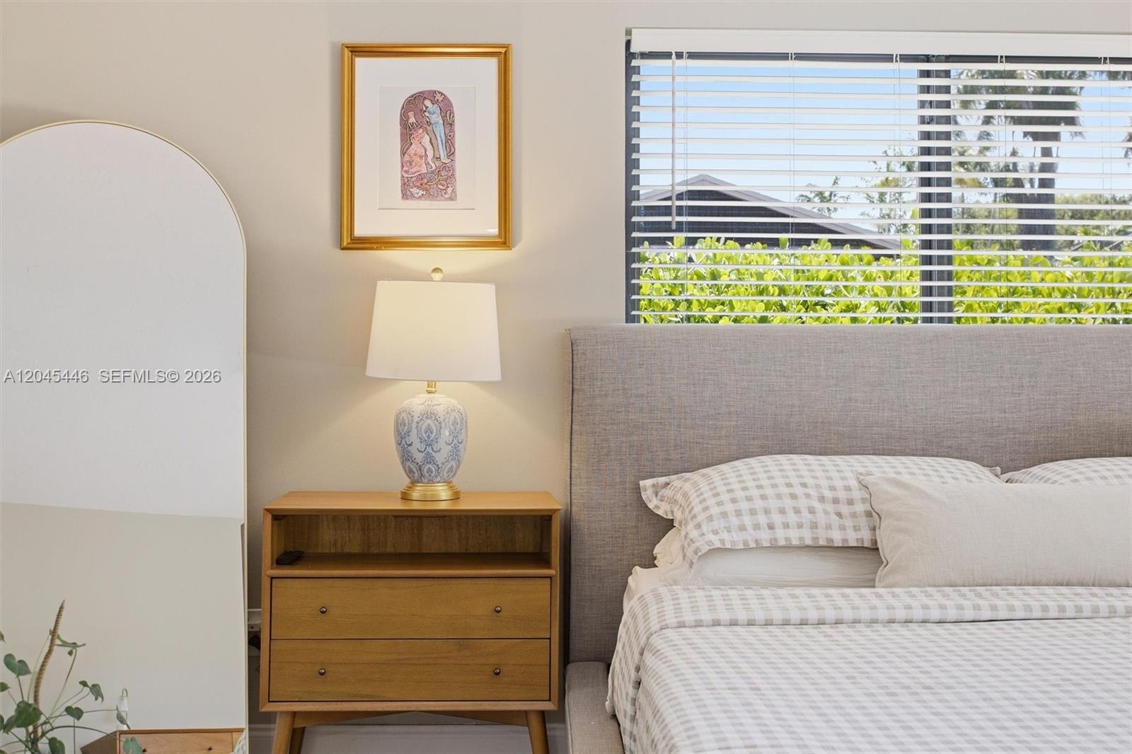 8440 Southwest 180th Street Palmetto Bay, FL 33157 - Photo 22 of 54 a bedroom with a bed and a window
