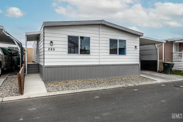 a view of a house with a street