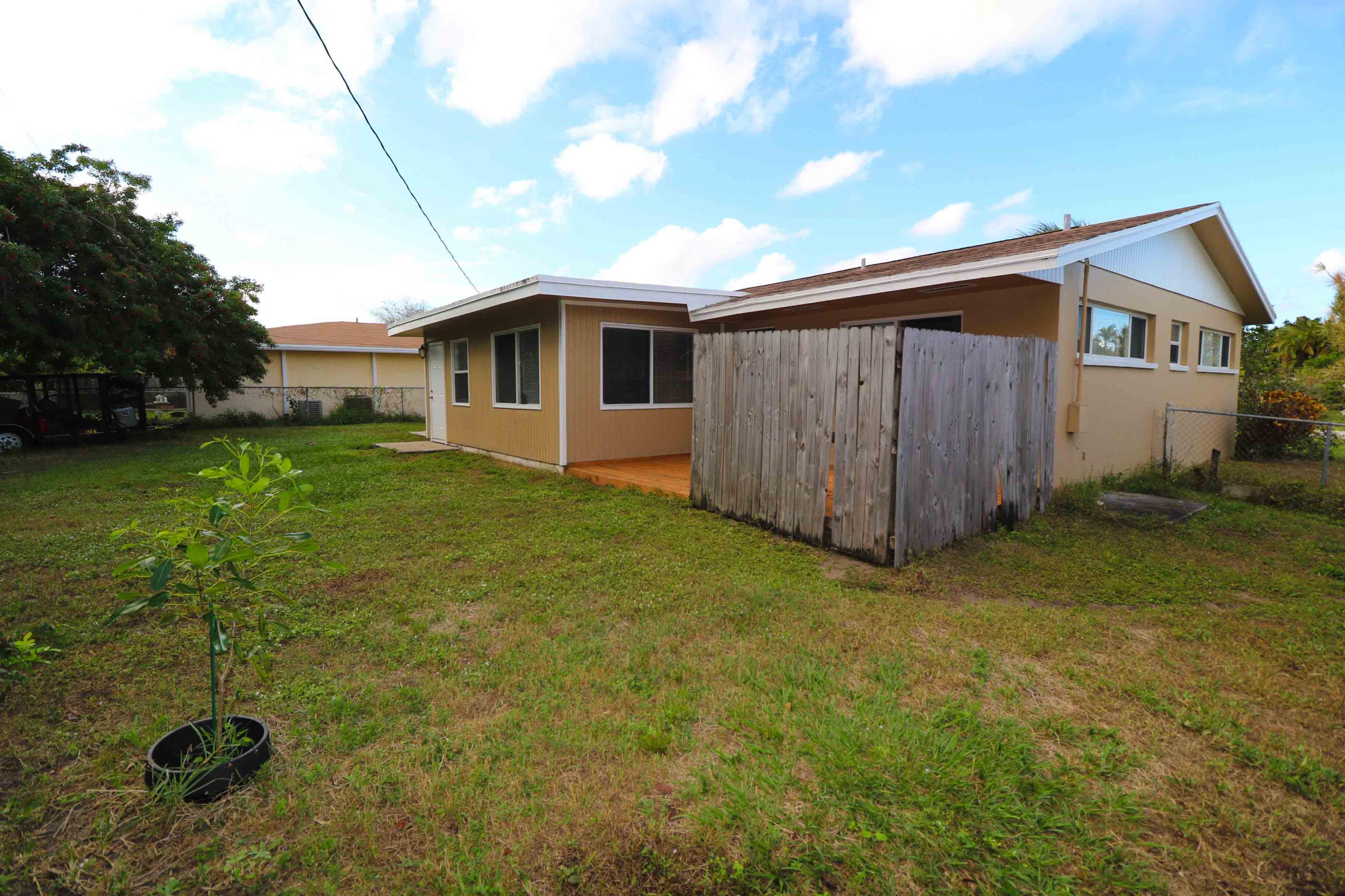 3302 Bermuda Road Palm Beach Gardens, FL 33410 - Photo 12 of 12 a house view with a backyard space