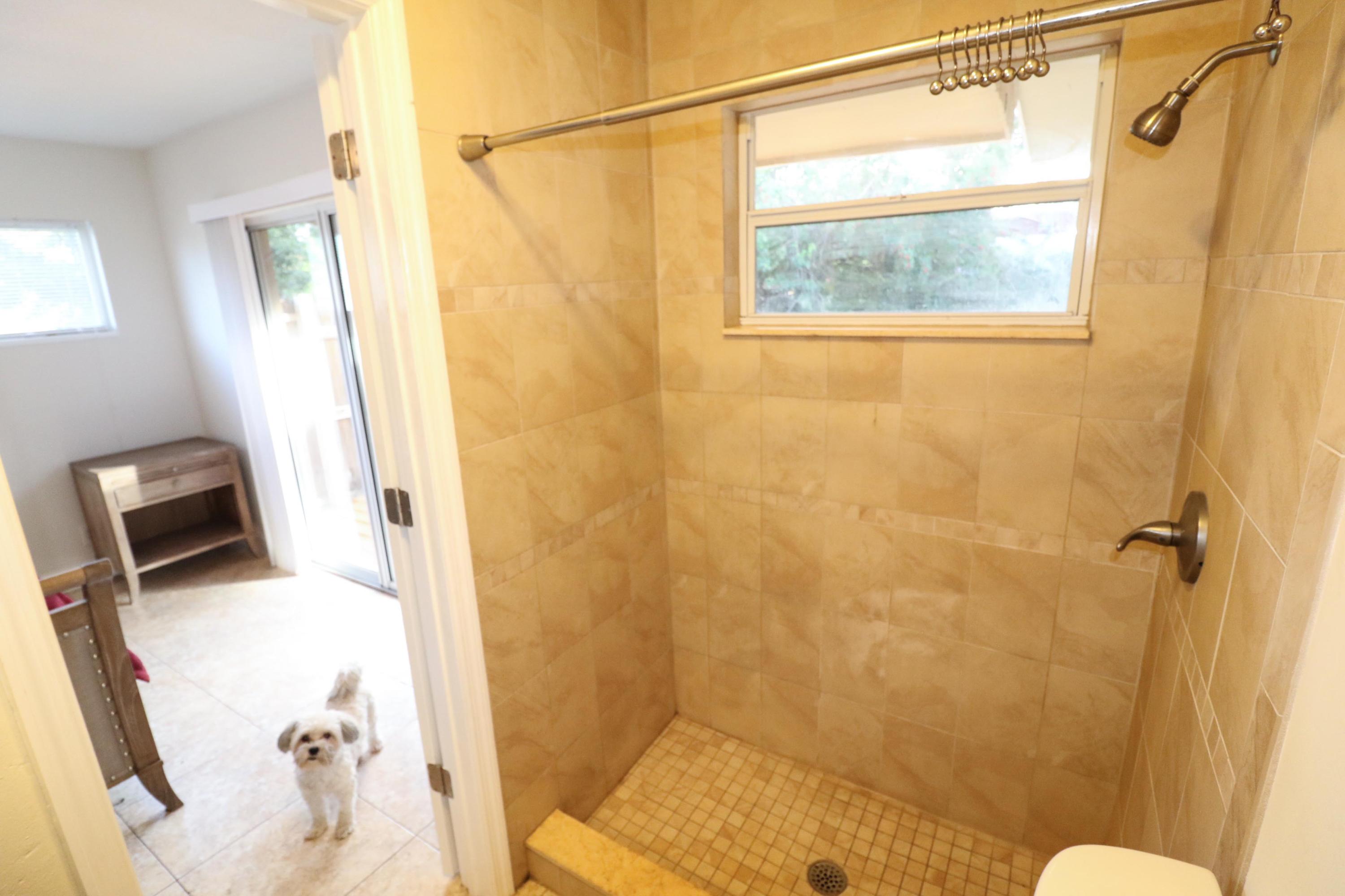 3302 Bermuda Road Palm Beach Gardens, FL 33410 - Photo 10 of 12 a bathroom with a shower