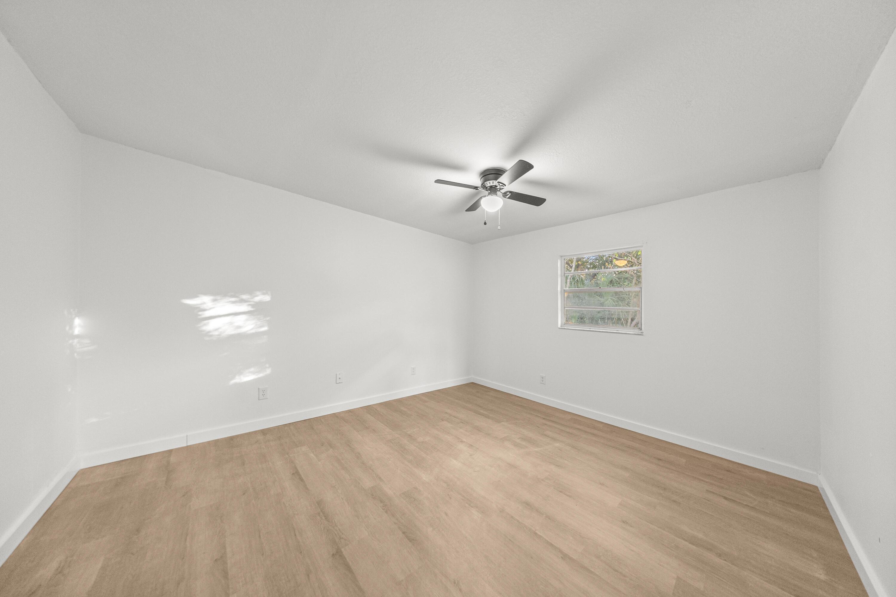2931 Southeast 52nd Avenue Ocala, FL 34480 - Photo 16 of 52 a view of a room with a hanging light