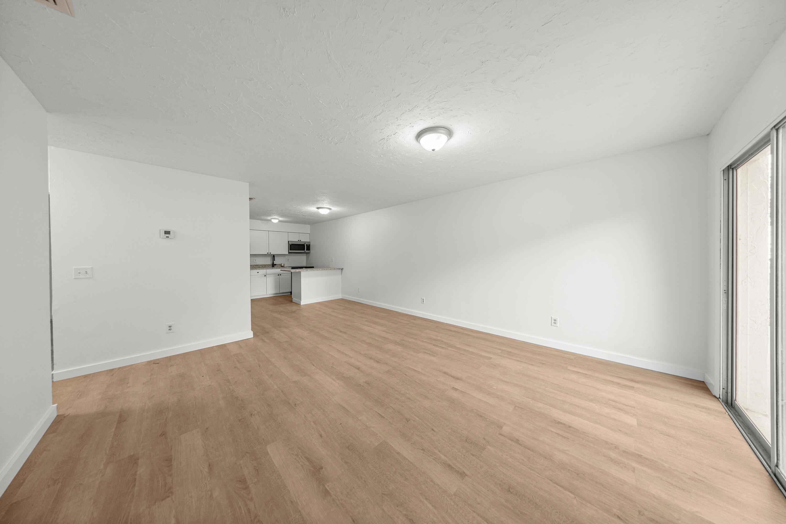 2931 Southeast 52nd Avenue Ocala, FL 34480 - Photo 38 of 52 a view of empty room with wooden floor