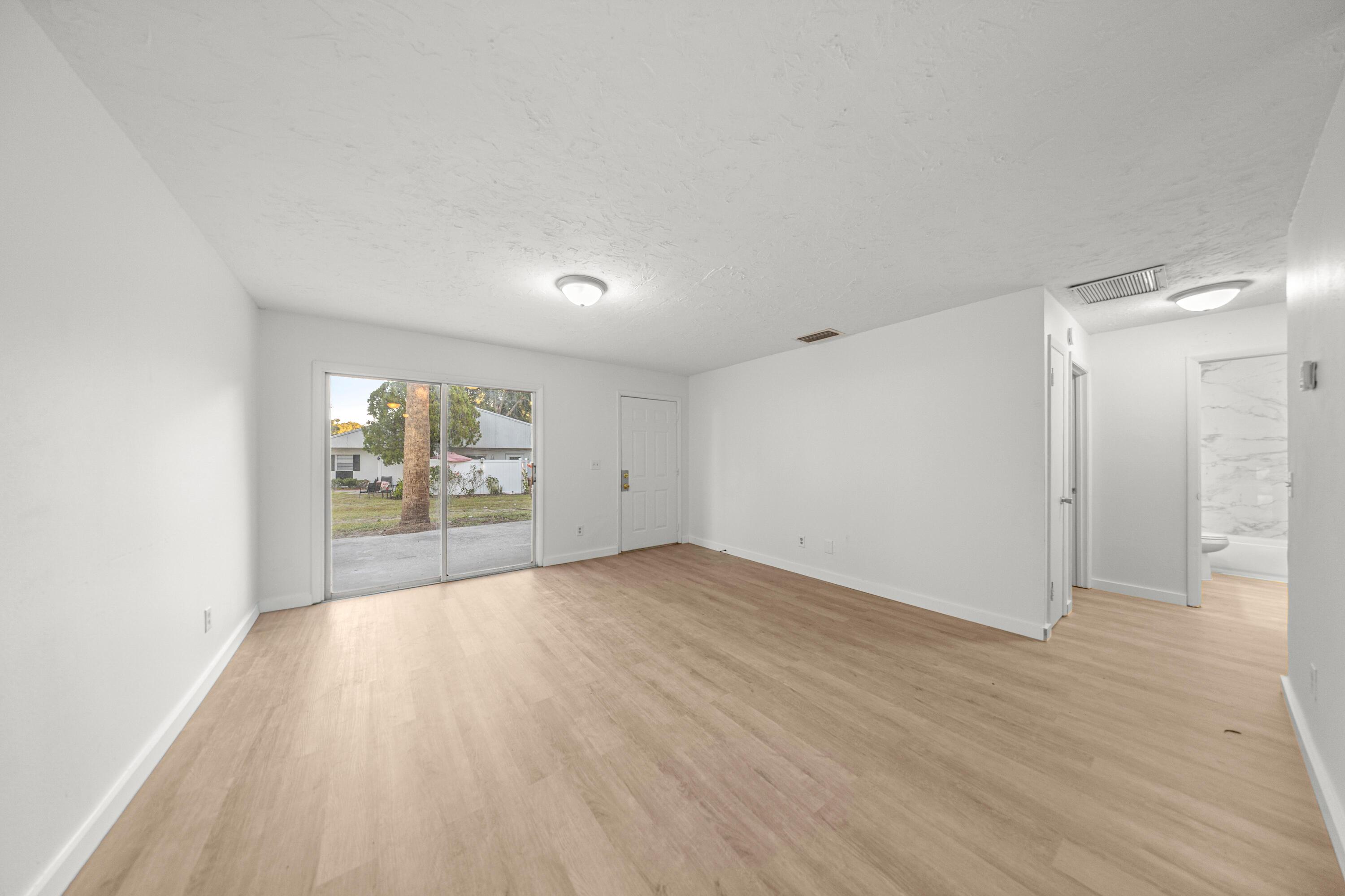 2931 Southeast 52nd Avenue Ocala, FL 34480 - Photo 42 of 52 a view of an empty room and window