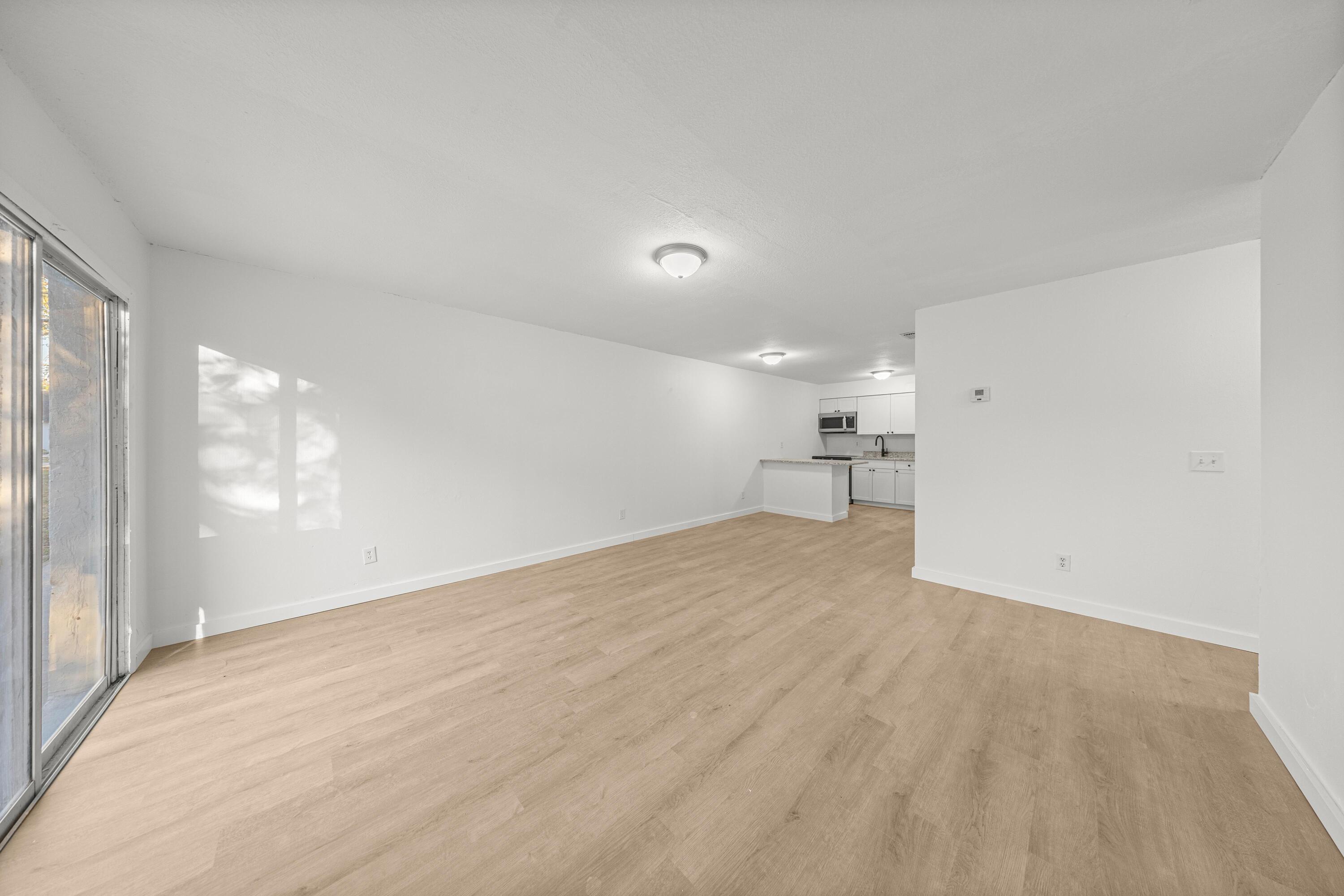 2931 Southeast 52nd Avenue Ocala, FL 34480 - Photo 7 of 52 a view of empty room with a kitchen