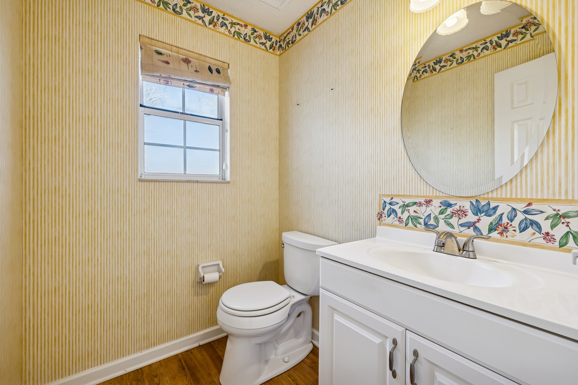3508 Daisy Trail Antioch, TN 37013 - Photo 19 of 46 a bathroom with a sink a toilet and a mirror