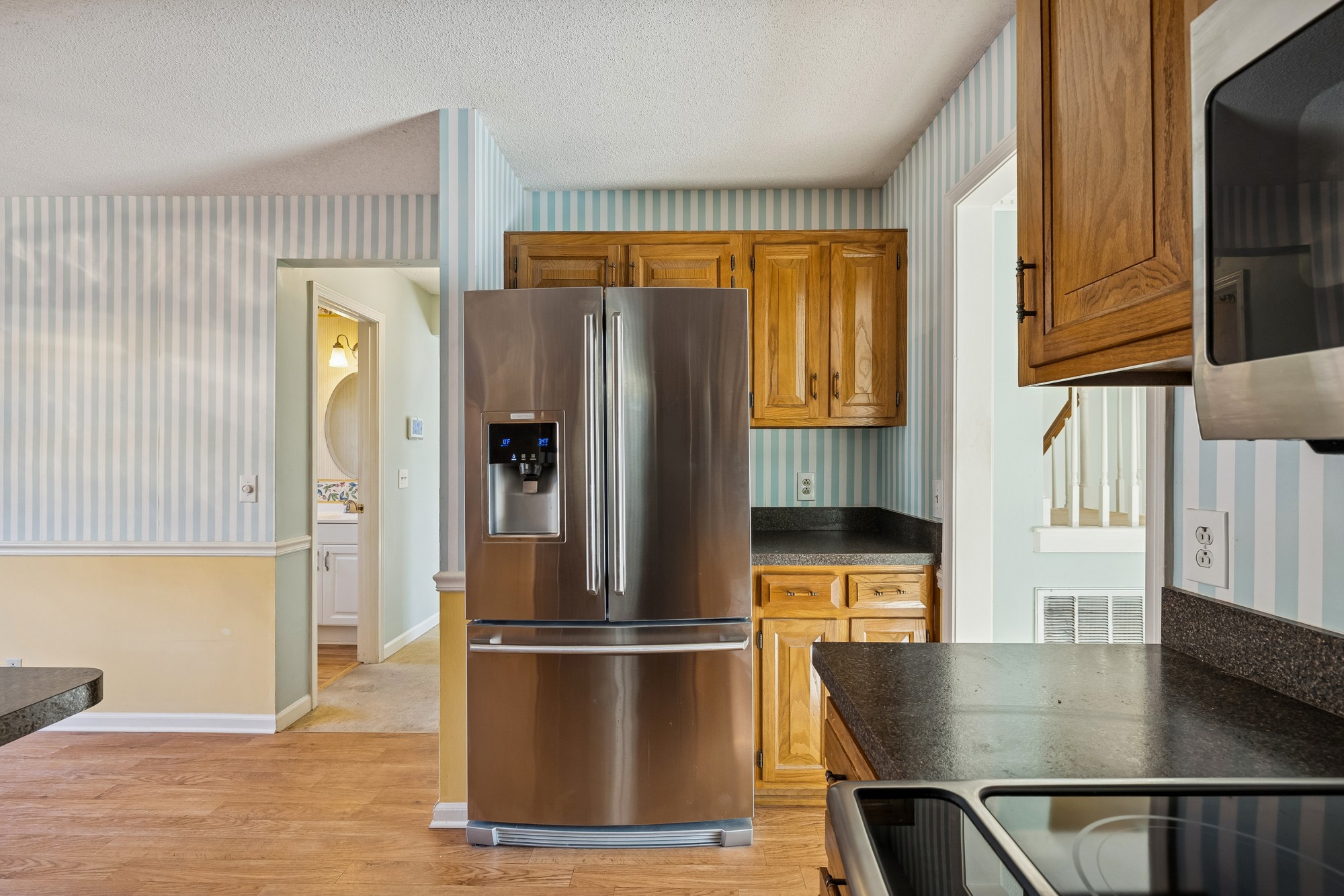 3508 Daisy Trail Antioch, TN 37013 - Photo 22 of 46 a kitchen with stainless steel appliances a refrigerator and a window