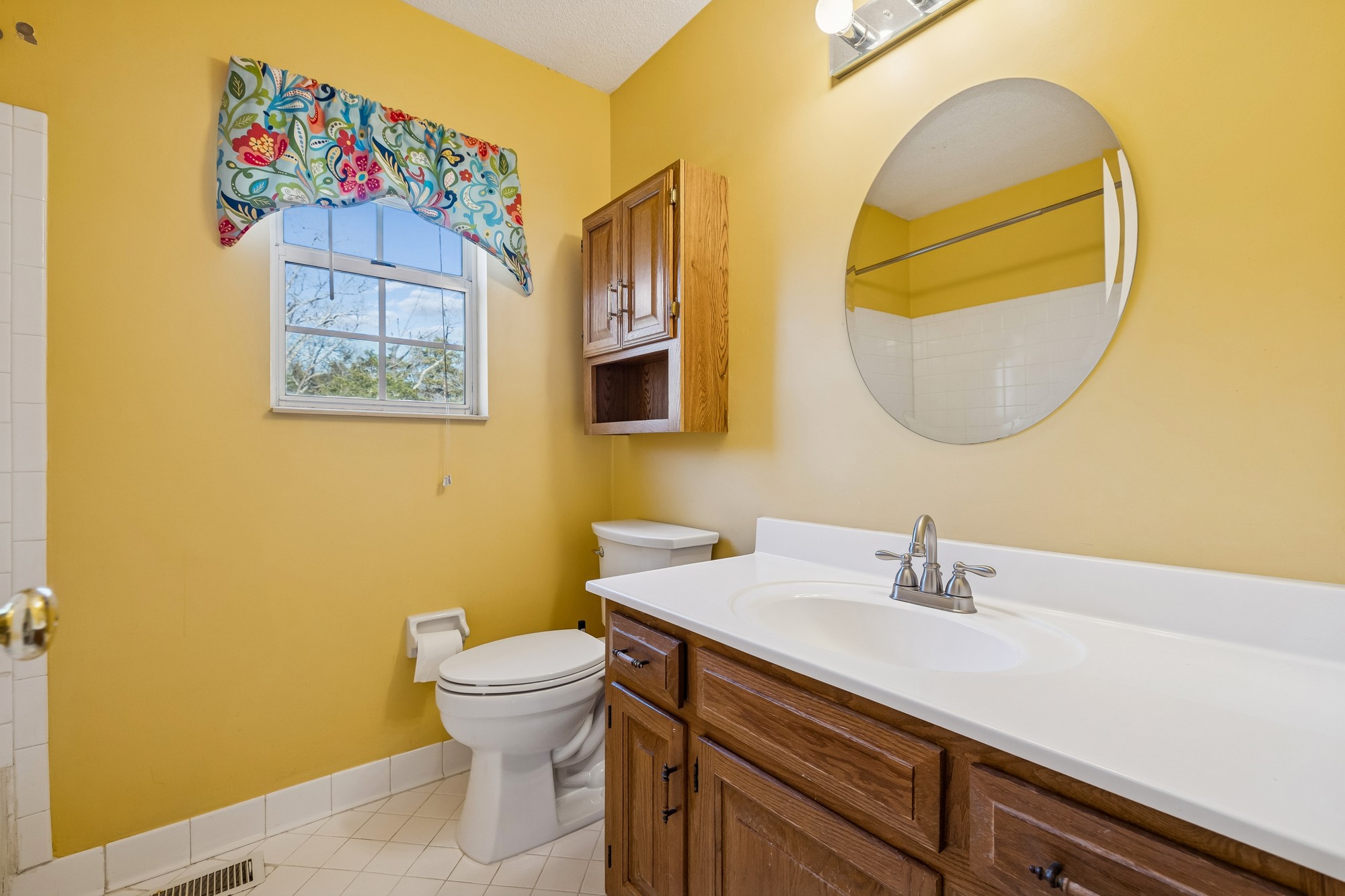 3508 Daisy Trail Antioch, TN 37013 - Photo 26 of 46 a bathroom with a sink mirror and toilet