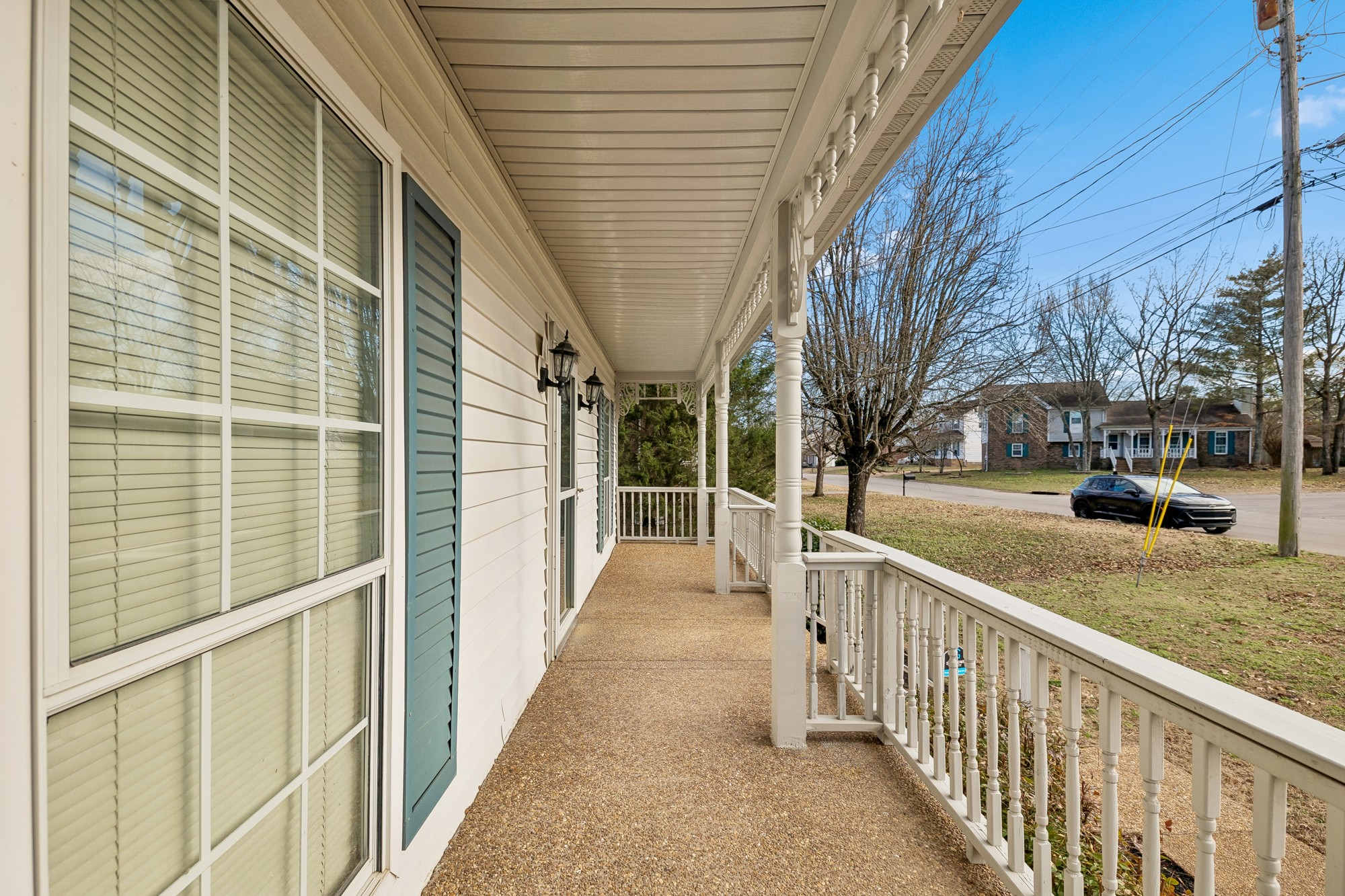 3508 Daisy Trail Antioch, TN 37013 - Photo 6 of 46 a view of a porch with wooden floor and fence