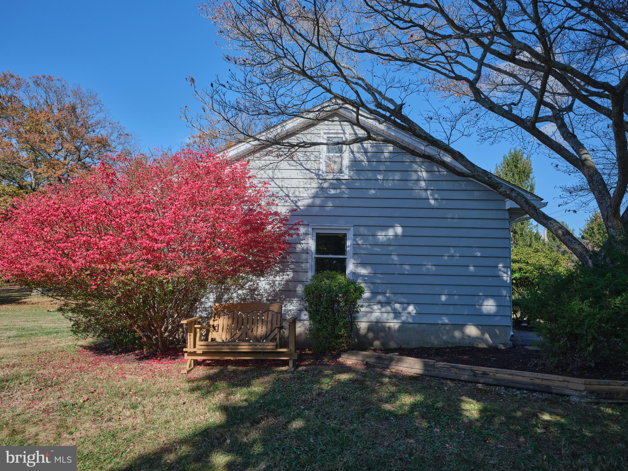 228 Iron Hill Road Doylestown, PA 18901 - Photo 12 of 33 a backyard of a house with lots of green space