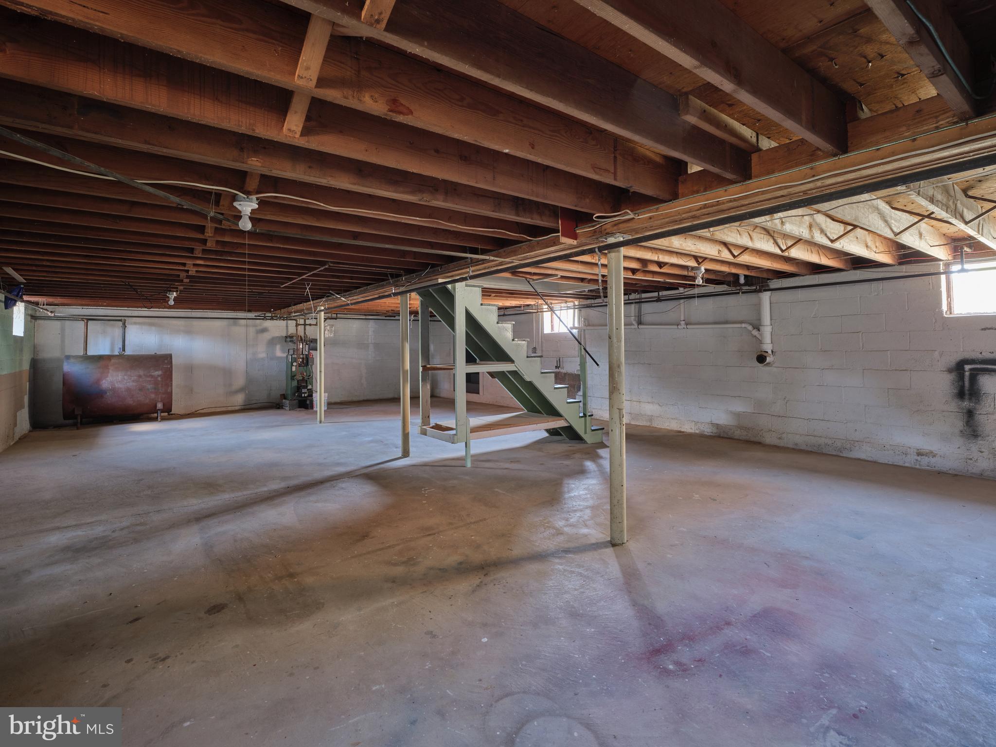 228 Iron Hill Road Doylestown, PA 18901 - Photo 30 of 33 a view of an empty room with wooden ceiling