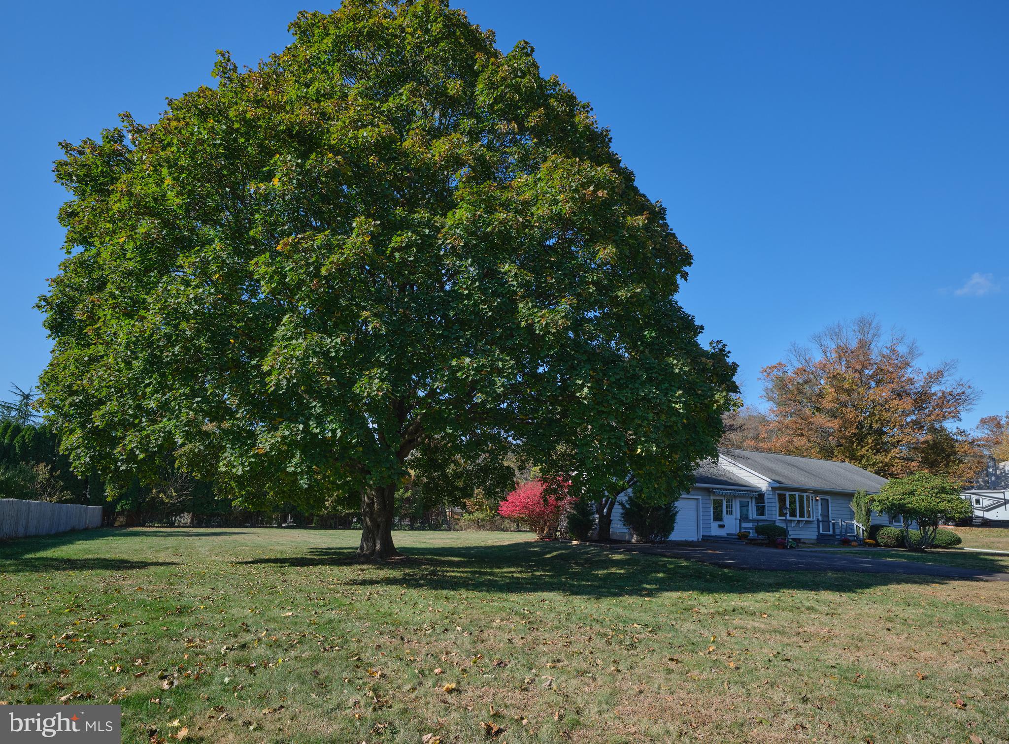 228 Iron Hill Road Doylestown, PA 18901 - Photo 4 of 33 a front view of a house with a yard