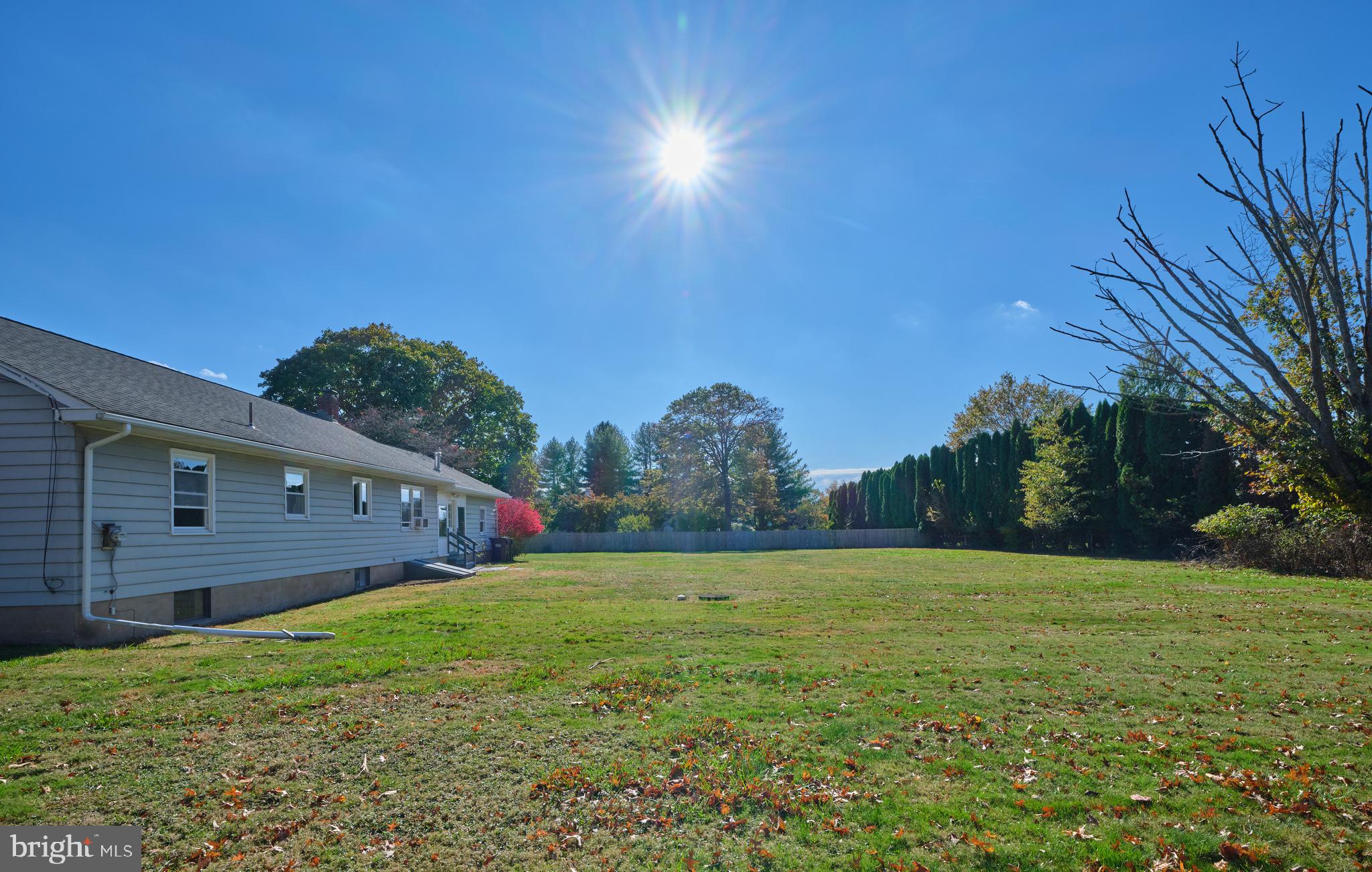 228 Iron Hill Road Doylestown, PA 18901 - Photo 9 of 33 a view of a backyard with a garden