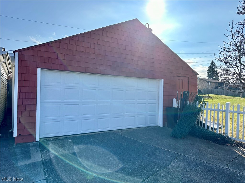 351 Rockdale Road Follansbee, WV 26037 - Photo 7 of 18 Garage with a lawn