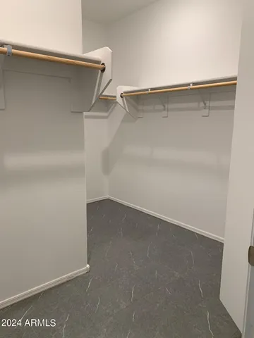a view of an empty walk in closet