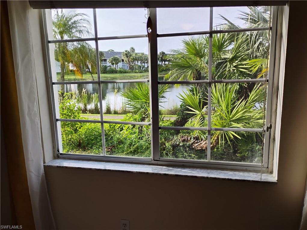 121 Gabriel Circle, Unit 7 Naples, FL 34104 - Photo 14 of 20 Room details with a water view