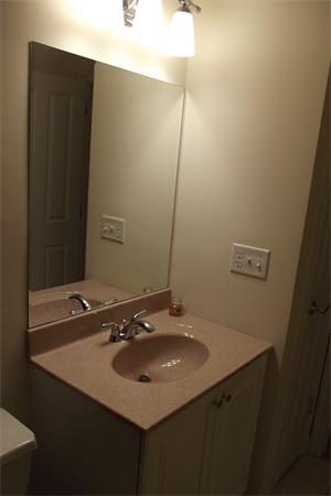 218 Rangeway Road, Unit 283 Billerica, MA 01862 - Photo 25 of 30 a bathroom with a sink and a mirror
