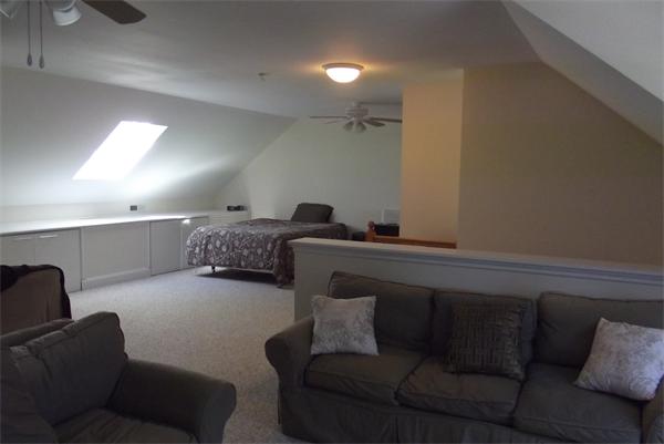218 Rangeway Road, Unit 283 Billerica, MA 01862 - Photo 28 of 30 a living room with furniture and a couch
