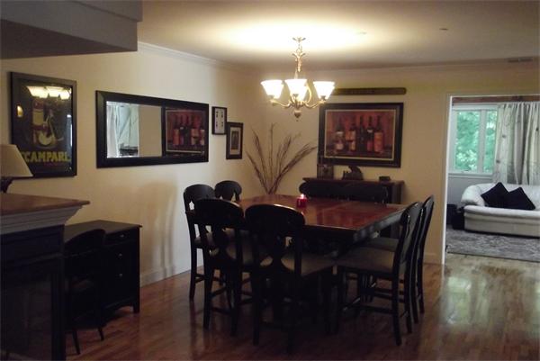 218 Rangeway Road, Unit 283 Billerica, MA 01862 - Photo 5 of 30 a view of a dining room with furniture a chandelier and wooden floor