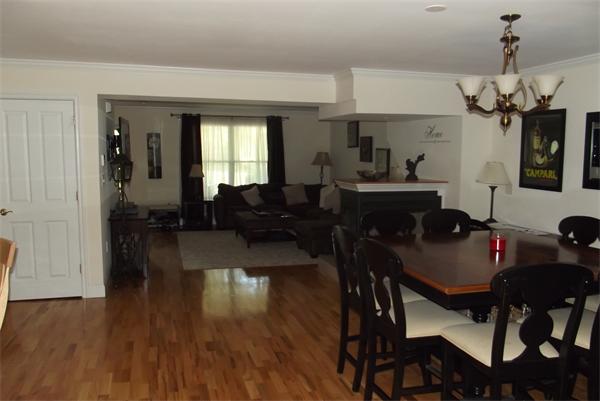 218 Rangeway Road, Unit 283 Billerica, MA 01862 - Photo 7 of 30 a view of a dining room with furniture window and wooden floor