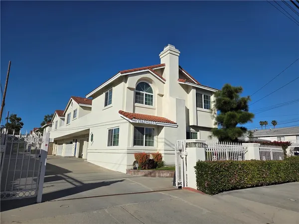 a front view of a house with a garage