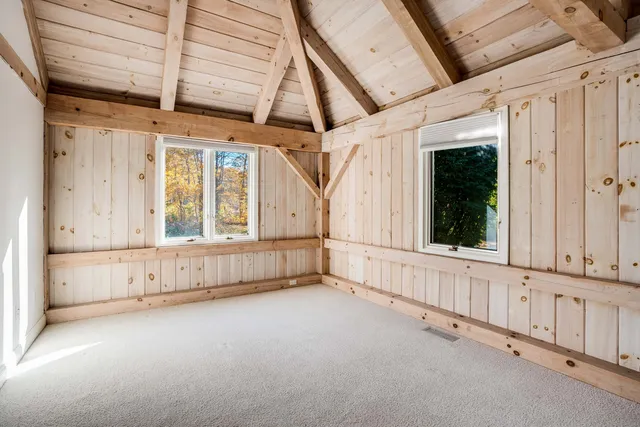 a bathroom with a toilet sink and a mirror