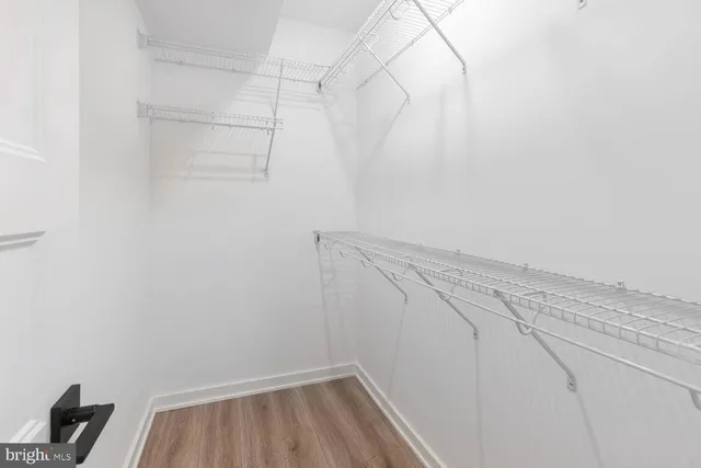 a view of a room with racks on the wall