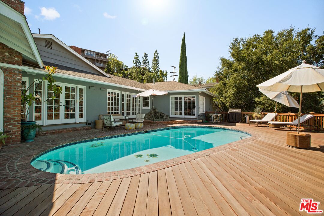 3333 Wrightwood Drive Studio City, CA 91604 - Photo 22 of 33 a view of house with swimming pool outdoor seating