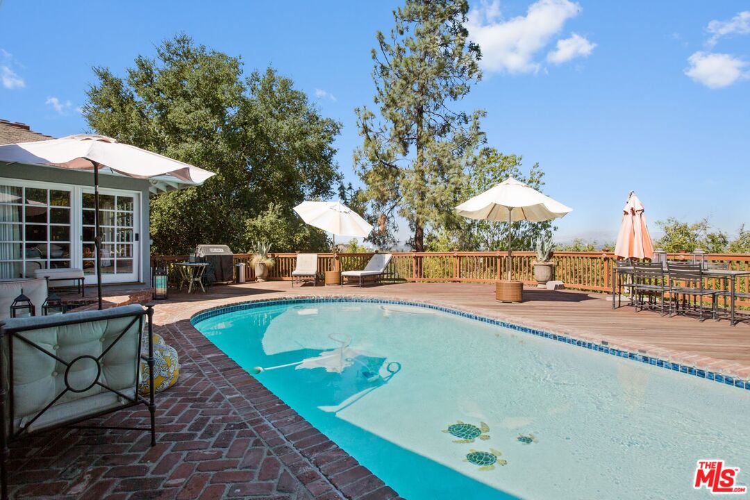 3333 Wrightwood Drive Studio City, CA 91604 - Photo 24 of 33 a swimming pool with outdoor seating and yard