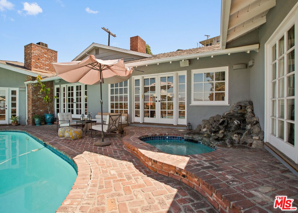 3333 Wrightwood Drive Studio City, CA 91604 - Photo 25 of 33 a front view of a house with patio