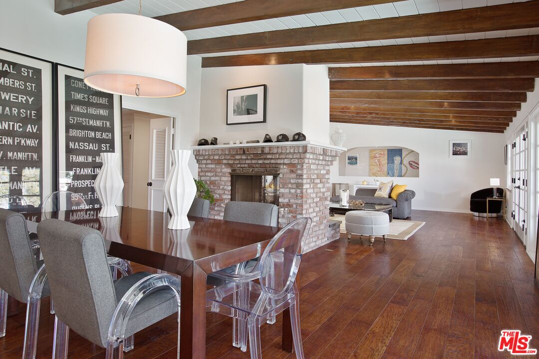 3333 Wrightwood Drive Studio City, CA 91604 - Photo 8 of 33 a living room with furniture and a fireplace