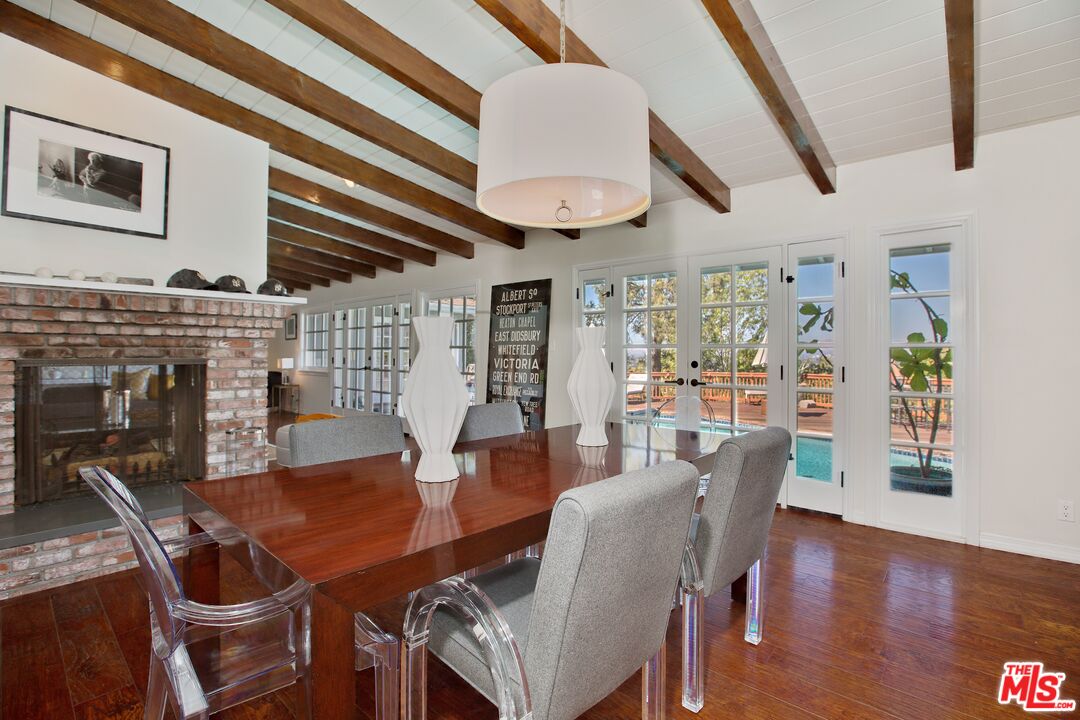 3333 Wrightwood Drive Studio City, CA 91604 - Photo 9 of 33 a view of a dining room with furniture window and wooden floor