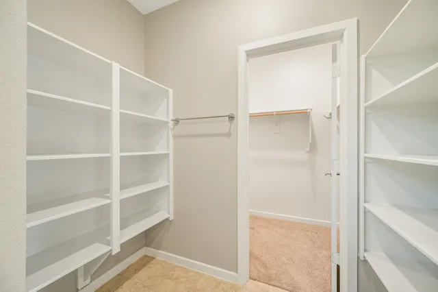 a view of an empty walk in closet
