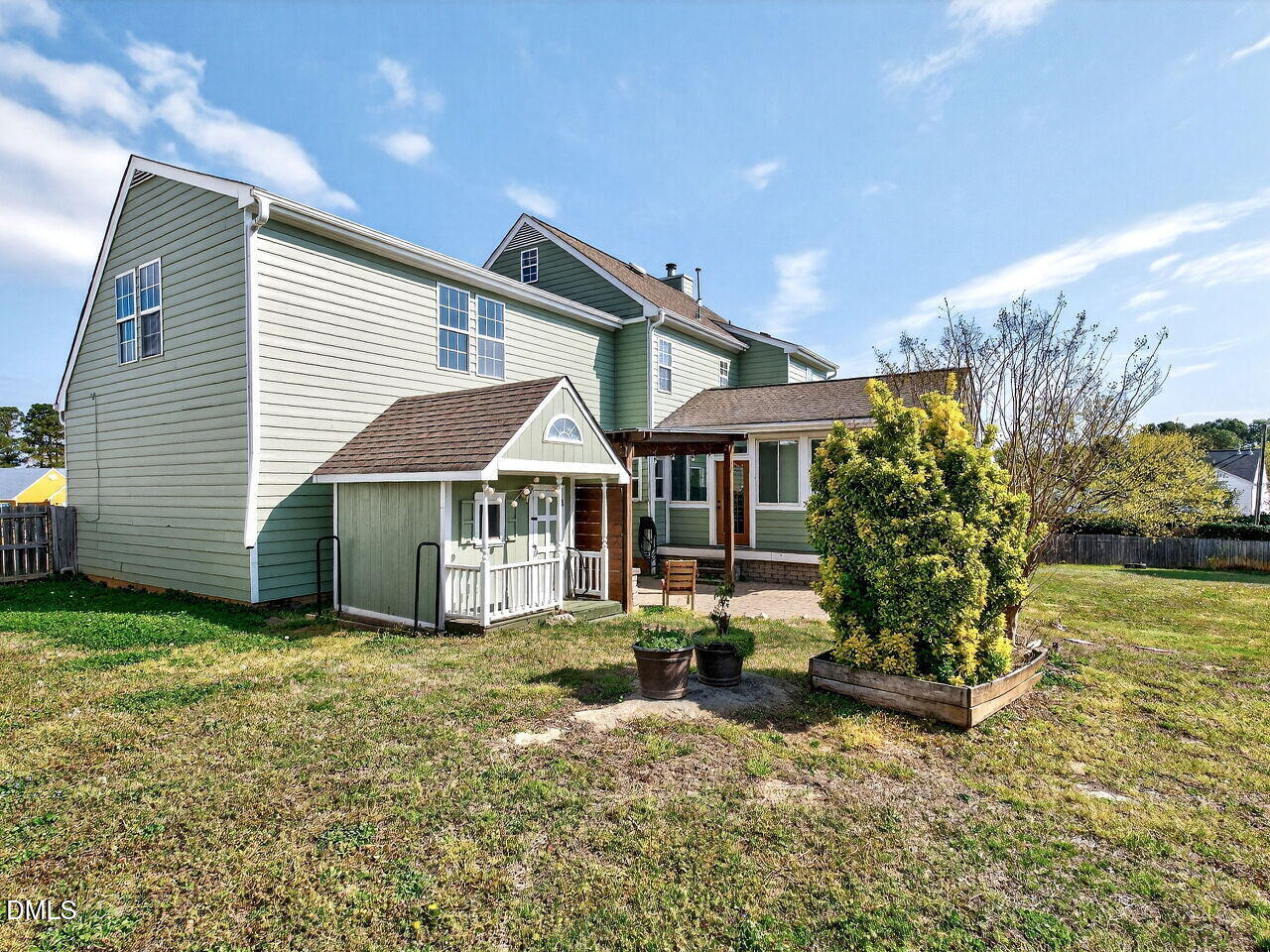 4500 Rivershyre Way Raleigh, NC 27616 - Photo 23 of 42 a view of a house with backyard and sitting area
