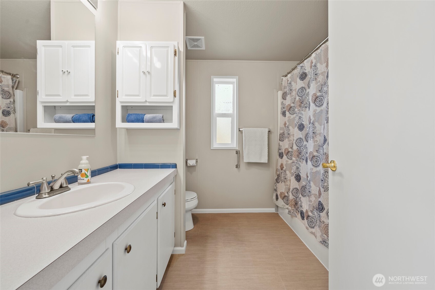23825 15th Avenue Southeast, Unit 108 Bothell, WA 98021 - Photo 17 of 39 a bathroom with a sink and a mirror