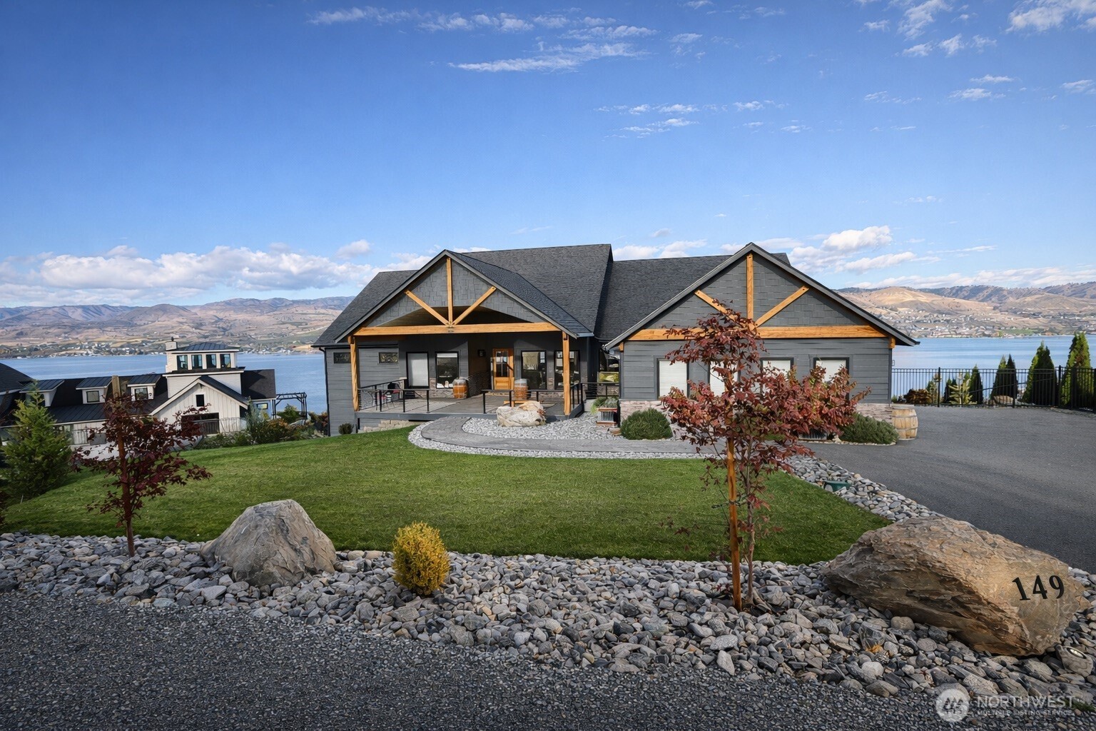 149 Clos Chevalle Road Chelan, WA 98816 - Photo 33 of 37 a front view of a house with garden