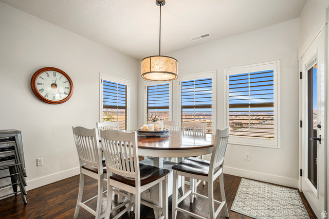 2311 South 1340 West St. George, UT 84770 - Photo 20 of 56 Dining area featuring healthy amount of natural light and dark wood-style floors