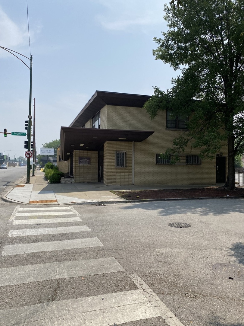 1401 East 87th Street Chicago, IL 60619 - Photo 3 of 5 a view of a house with a street