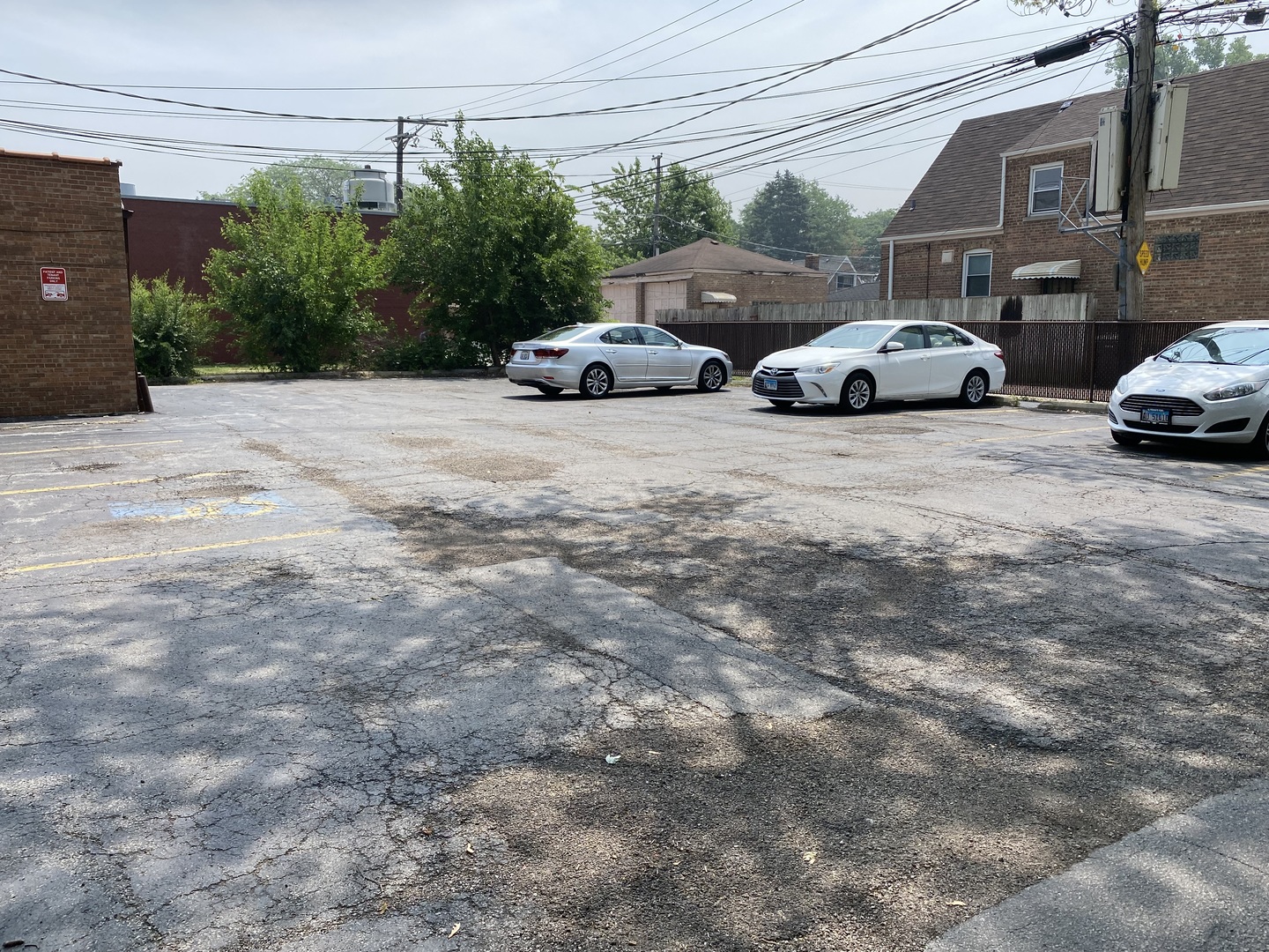 1401 East 87th Street Chicago, IL 60619 - Photo 5 of 5 a view of a cars parked on the side of a street