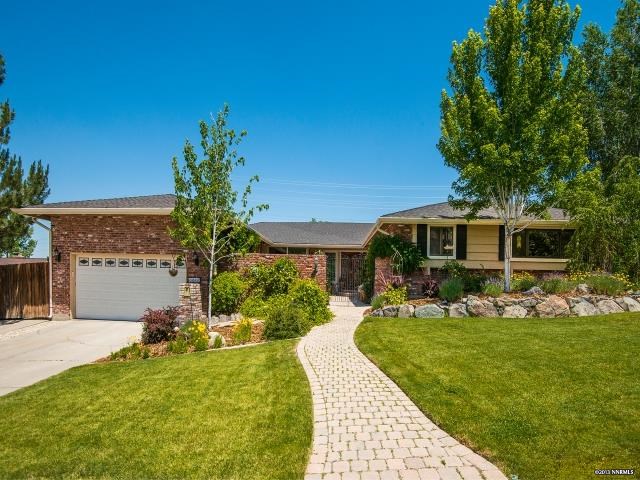 2040 Del Rio Lane Reno, NV 89509 - Photo 1 of 1 a front view of a house with garden