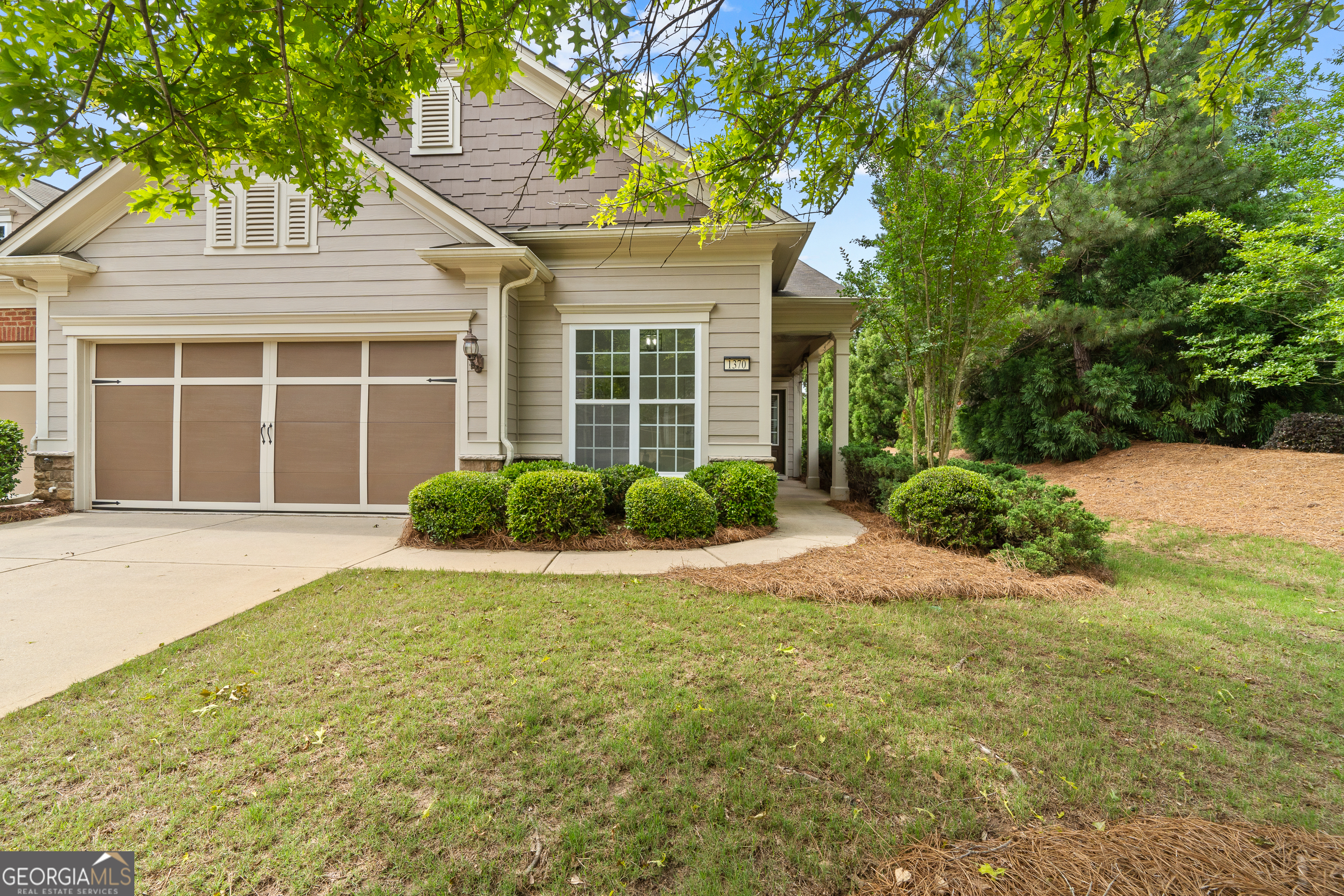 1370 Summer Hollow Road Greensboro, GA 30642 - Photo 2 of 35 front view of a house with a yard