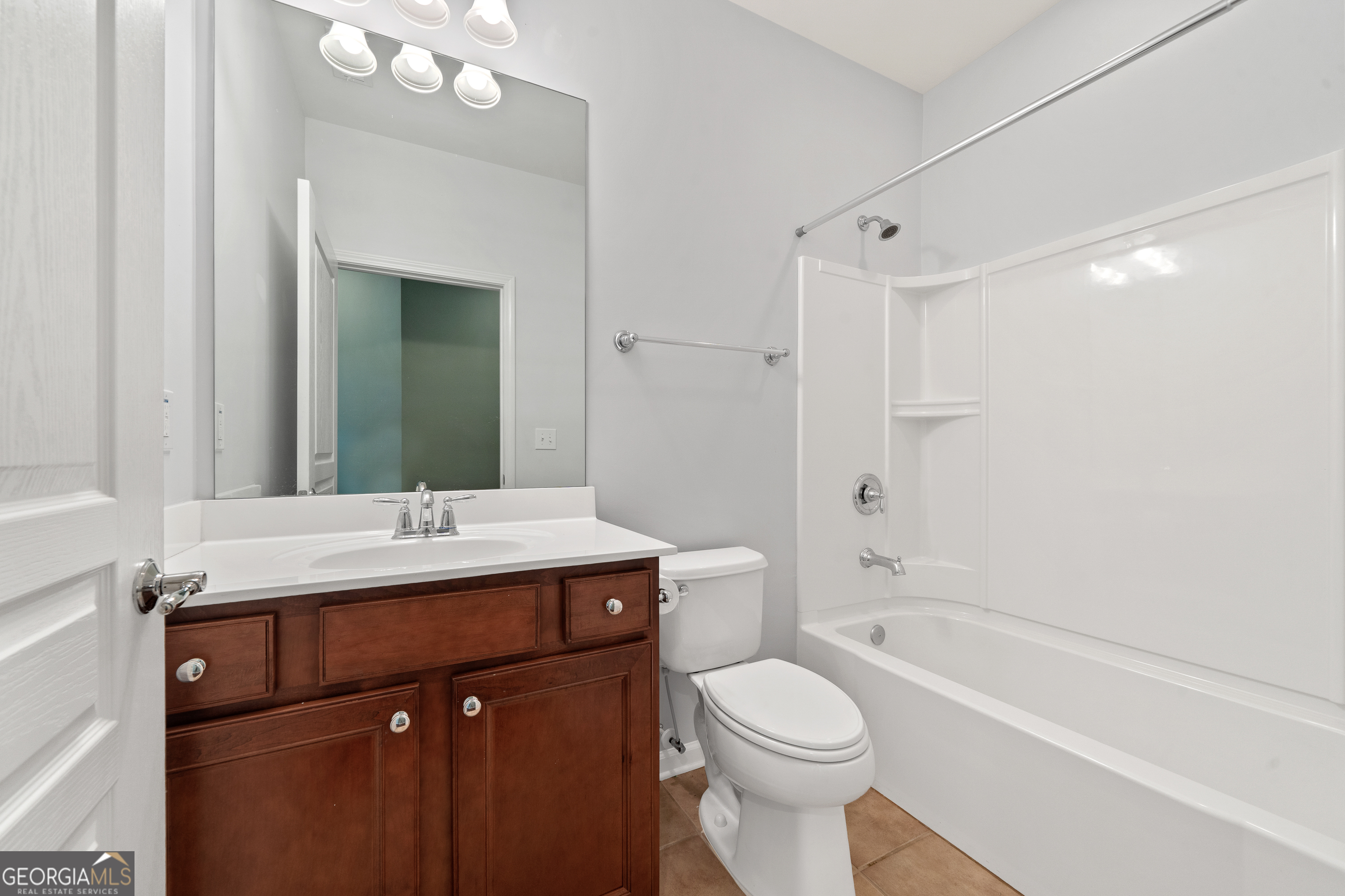1370 Summer Hollow Road Greensboro, GA 30642 - Photo 27 of 35 a bathroom with a bathtub shower sink vanity mirror and toilet
