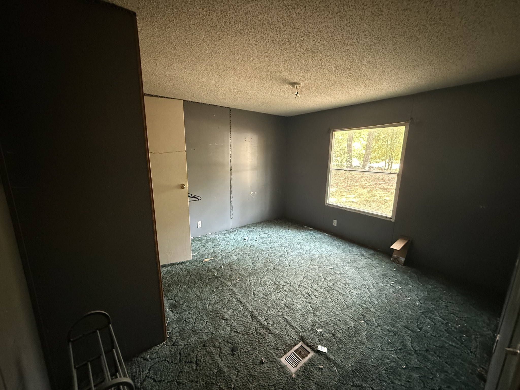 130 Hawk Ridge Road Summertown, TN 38483 - Photo 12 of 14 a view of an empty room with a window