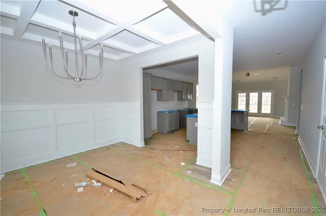 a view of a room with a chandelier