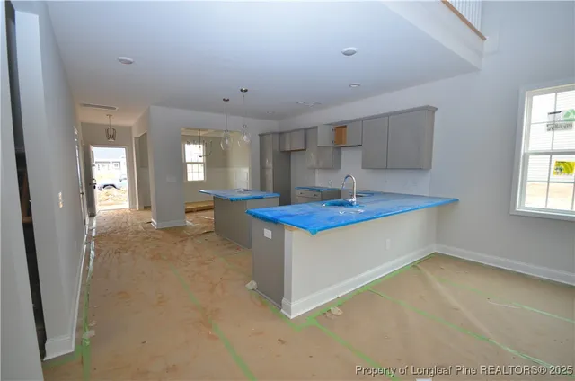 a view of kitchen and sink