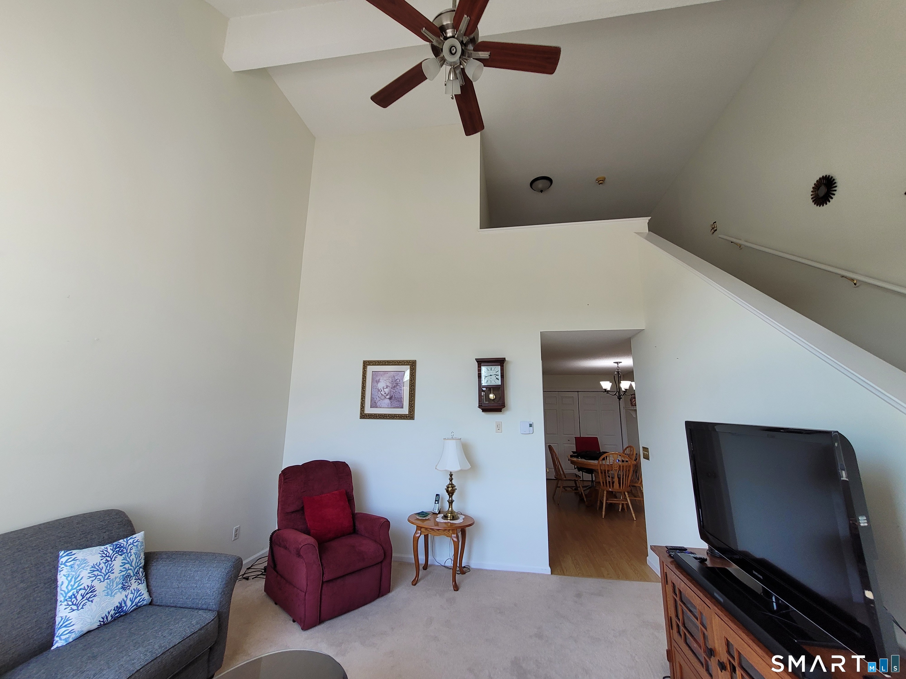 35 Ruth Street, Unit 44 Bristol, CT 06010 - Photo 13 of 35 a living room with furniture and a flat screen tv