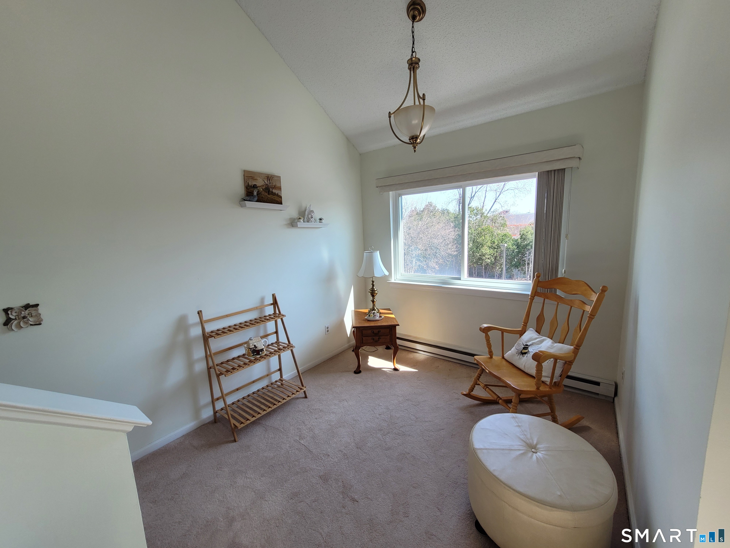 35 Ruth Street, Unit 44 Bristol, CT 06010 - Photo 15 of 35 a room with furniture gym equipment and windows